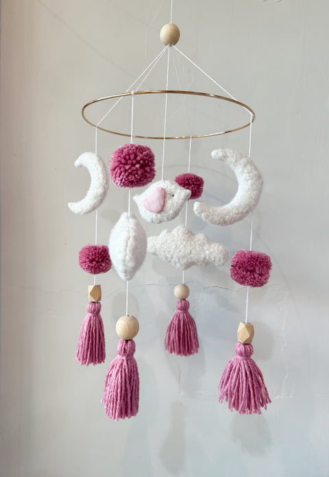 Móvil pajarito y nubes