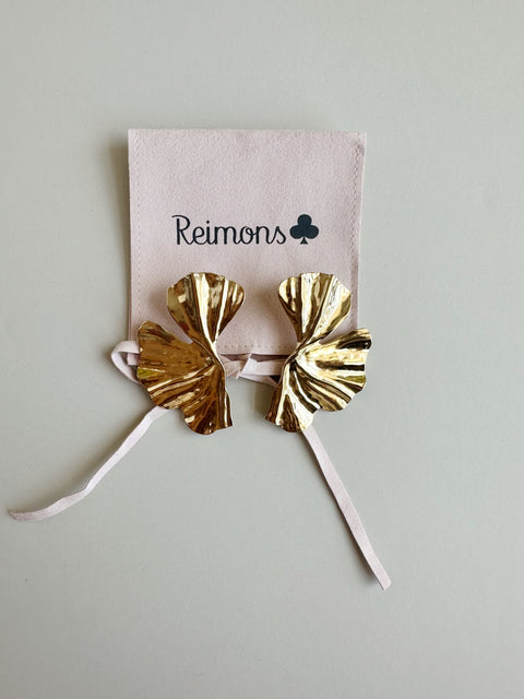 Aretes pétalo Reimons